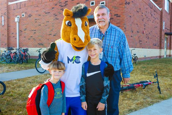 Students walking to school for National Walk to School Day.